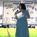 Lisa addresses to crowd at The Open